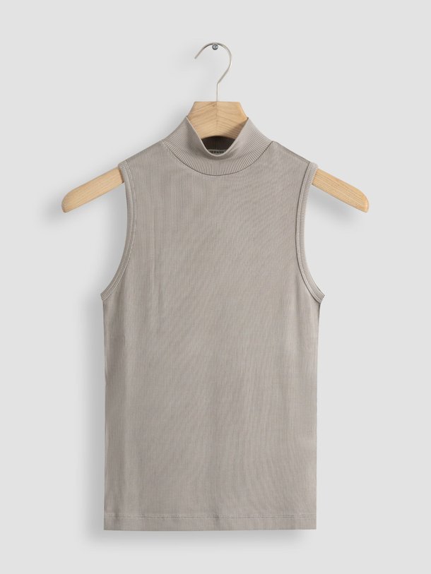 Ontdek de Laran viscose rib top van Drykorn in de kleur bruingrijs bij Orangebag. Op werkdagen voor 21:45 besteld, morgen in huis.