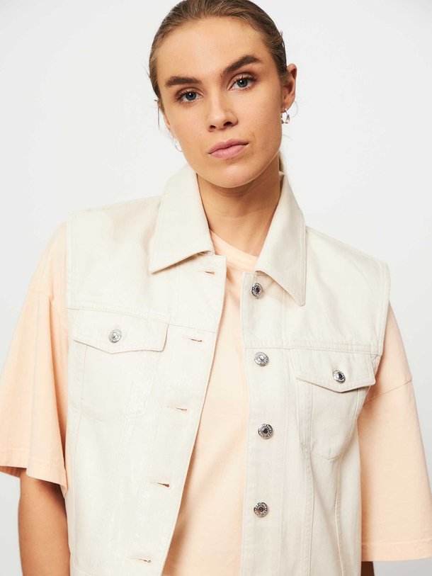 Ontdek de Hansall denim gilet van Drykorn in de kleur off-white bij Orangebag. Op werkdagen voor 21:45 besteld, morgen in huis.