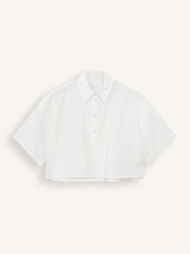 Ontdek de Zylora viscosemix polo top met structuur van Drykorn in de kleur wit bij Orangebag. Op werkdagen voor 21:45 besteld, morgen in huis.