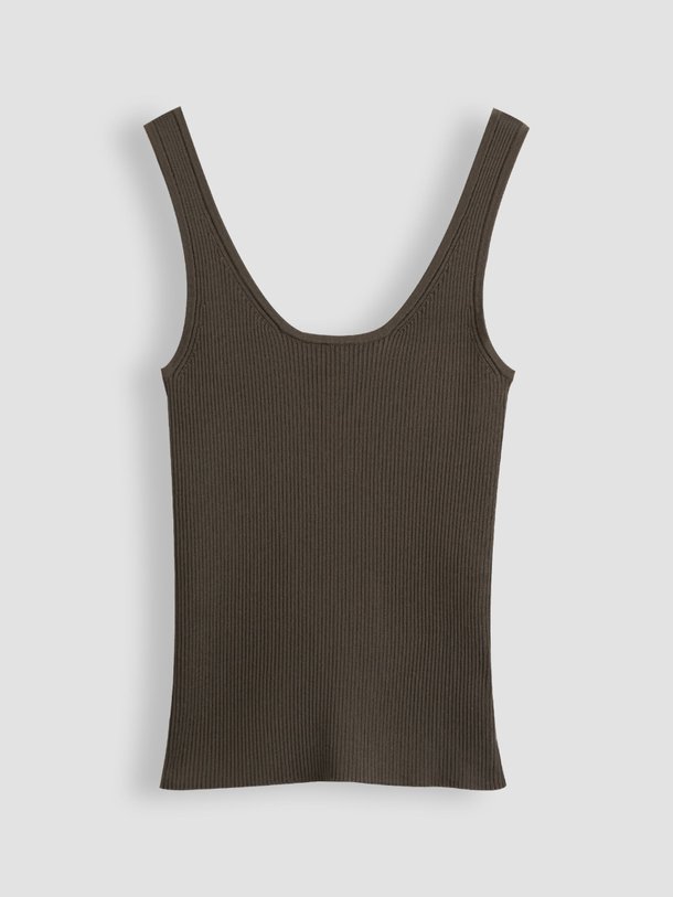 Ontdek de Defny ribgebreide top van Drykorn in de kleur donkergroen bij Orangebag. Op werkdagen voor 21:45 besteld, morgen in huis.