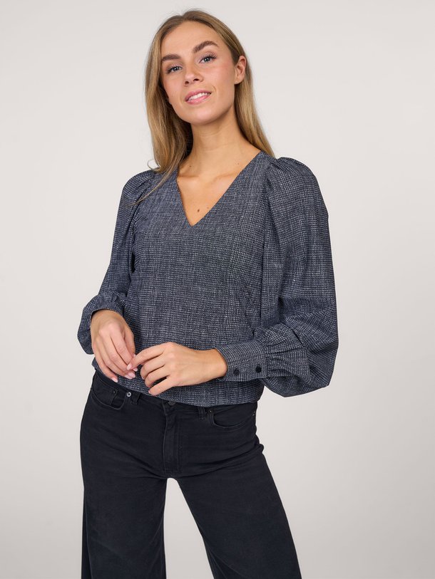 Ontdek de Bodi light travel jersey tweed top van Studio Anneloes in de kleur zwart bij Orangebag. Op werkdagen voor 21:45 besteld, morgen in huis.