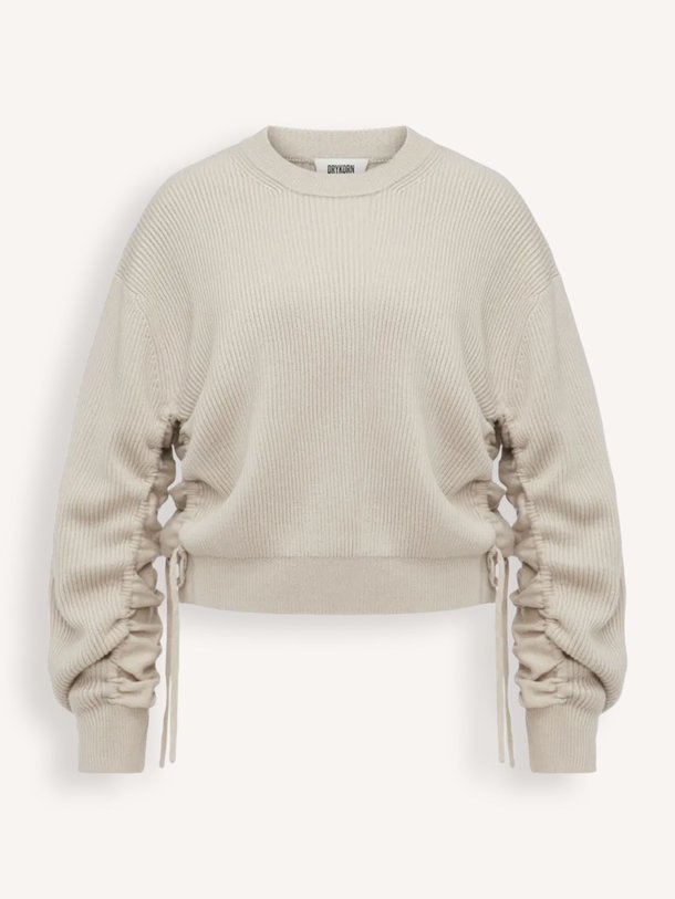 Ontdek de Kebedi wollen rib trui van Drykorn in de kleur beige bij Orangebag. Op werkdagen voor 21:45 besteld, morgen in huis.