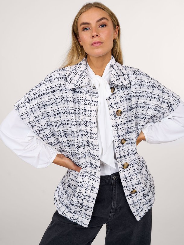 Ontdek de Norah katoenmix tweed gilet van Studio Anneloes in de kleur wit bij Orangebag. Op werkdagen voor 21:45 besteld, morgen in huis.