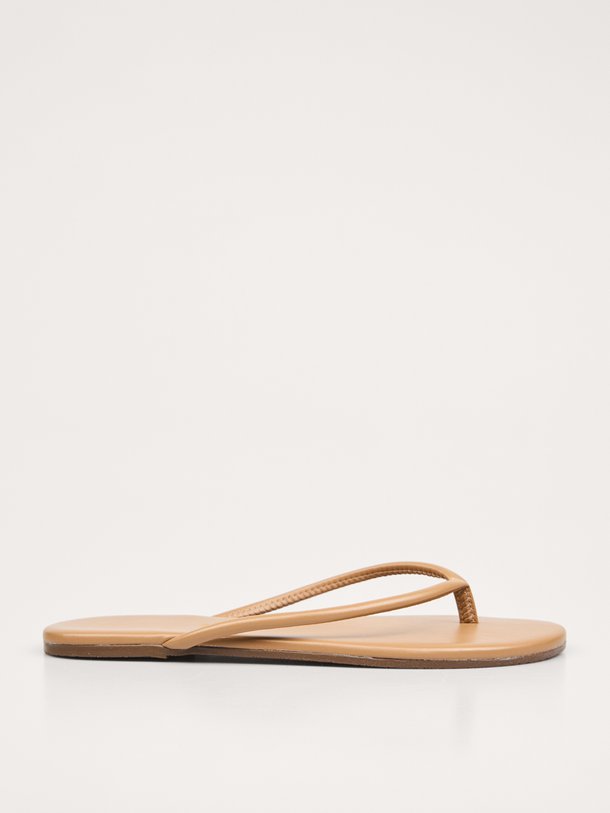 Tubular Lily, lederen slippers