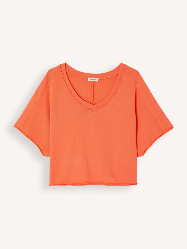 Shop de American Vintage VIBTOWN bij Orangebag. Dit koraalrode T-shirt van 100% katoen heeft een relaxte pasvorm en een stijlvolle V-hals. Ontdek het nu!