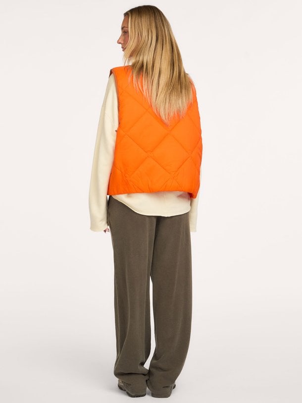 Yupibam, geweven bodywarmer