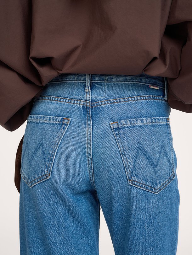 THE LEMON TWIST SNEAK The Lemon Twist Sneak, high waist wide leg jeans