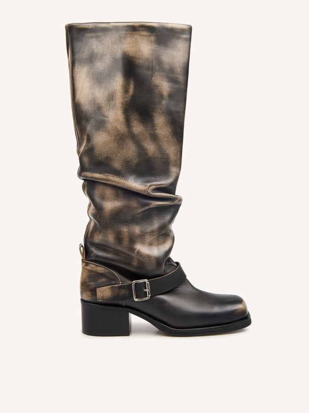 Toral CLIDE online kopen | Orangebag Ontdek de Toral CLIDE: stoere leren slouchy laarzen met een unieke metallic finish. Shop deze eyecatchers nu online bij Orangebag.