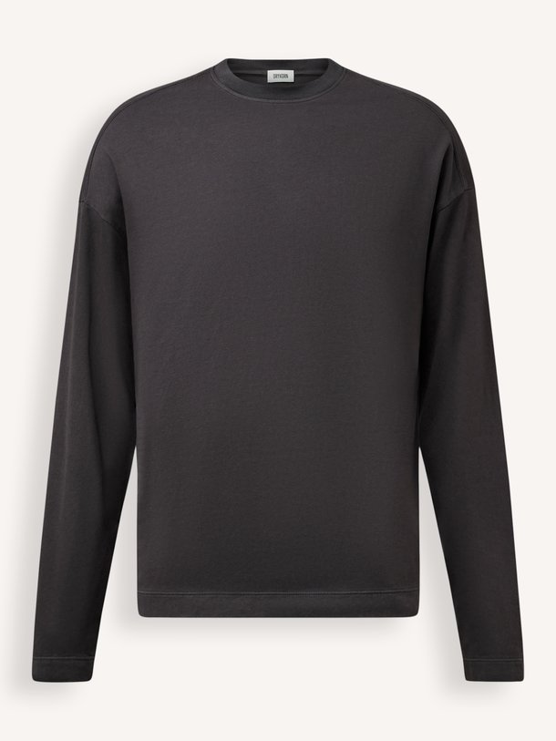 Ontdek de veelzijdige Drykorn 520005 longsleeve in tijdloos zwart. Een onmisbare basic met een relaxte pasvorm voor een moeiteloze, stijlvolle look.