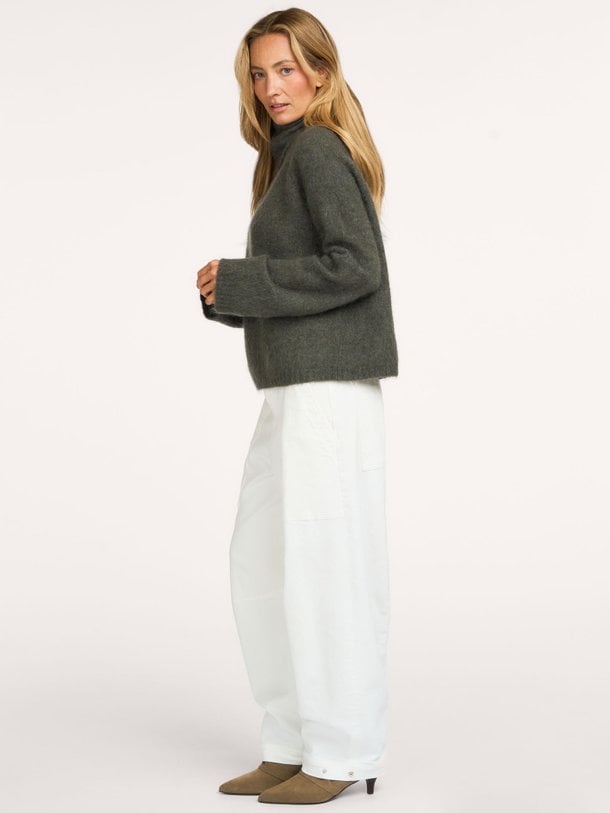 No Man's Land 66.006 online kopen | Orangebag Shop de No Man's Land 66.006 coltrui bij Orangebag. Een luxe, donkergrijze knit van mohair en wol met een prachtige losvallende pasvorm. Tijdloos en stijlvol.