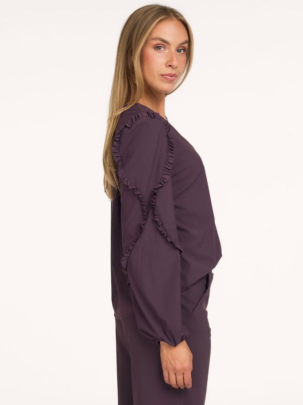 Ingrid ruffle blouse Ingrid, medium travel jersey blouse
